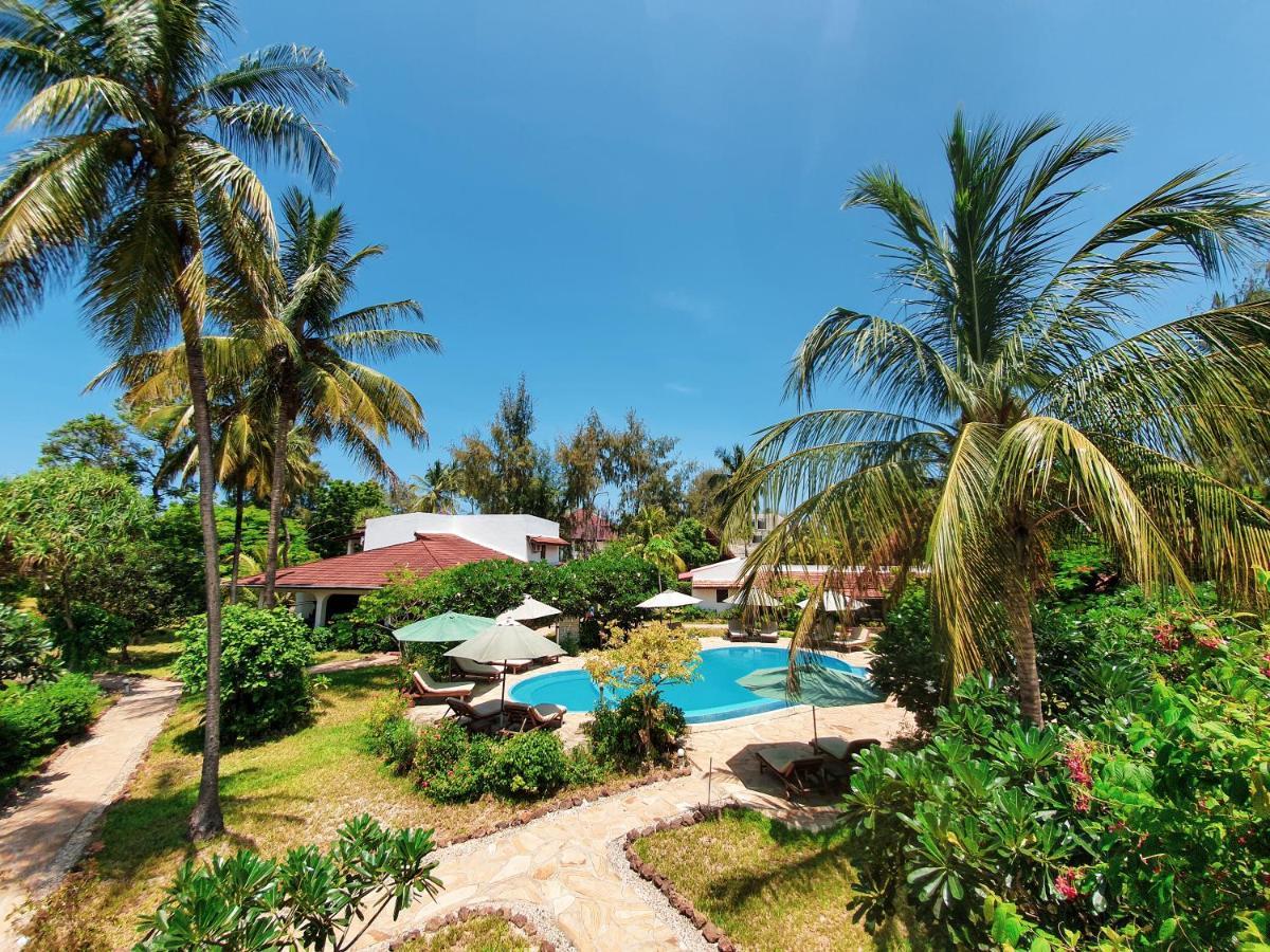 เฟลม ทรี คอตเทจเจส Hotel นูงวี ภายนอก รูปภาพ