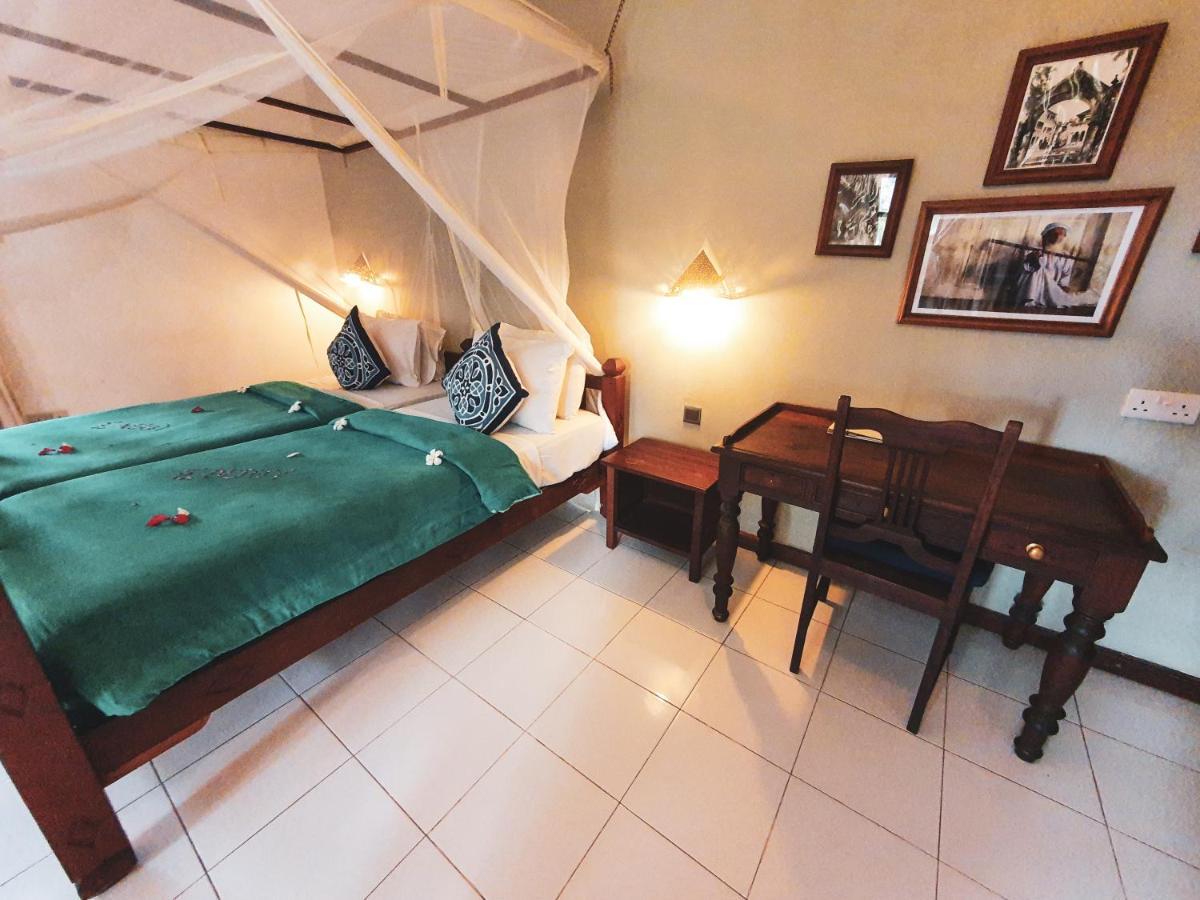 เฟลม ทรี คอตเทจเจส Hotel นูงวี ภายนอก รูปภาพ