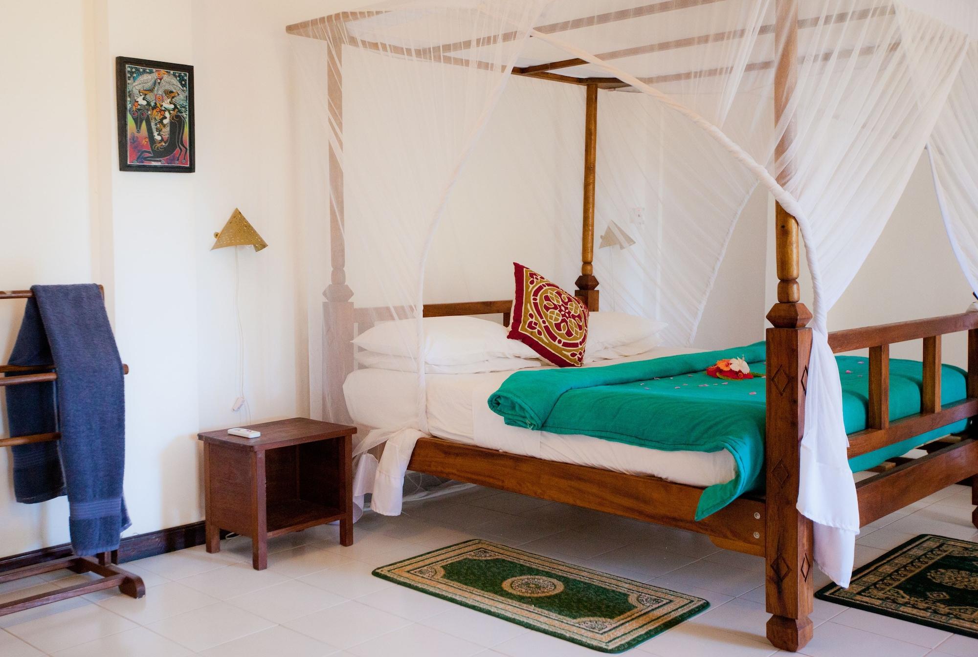 เฟลม ทรี คอตเทจเจส Hotel นูงวี ภายนอก รูปภาพ
