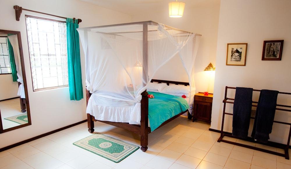 เฟลม ทรี คอตเทจเจส Hotel นูงวี ภายนอก รูปภาพ