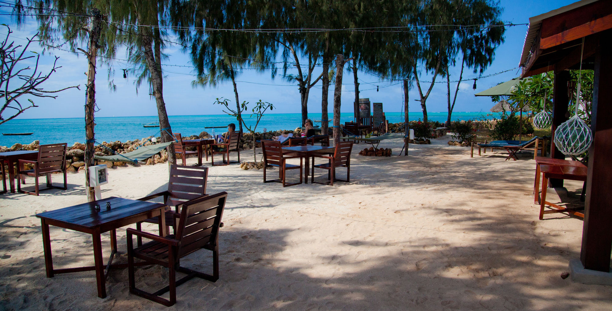 เฟลม ทรี คอตเทจเจส Hotel นูงวี ภายนอก รูปภาพ